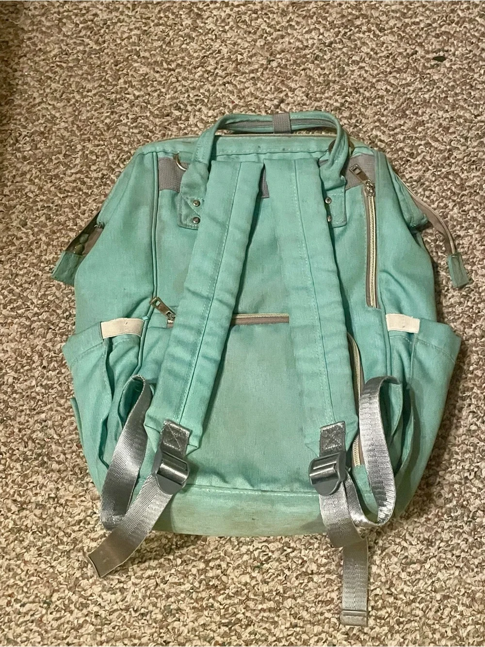 Mint Green Canvas Backpack with Top Handle and Front Pocket